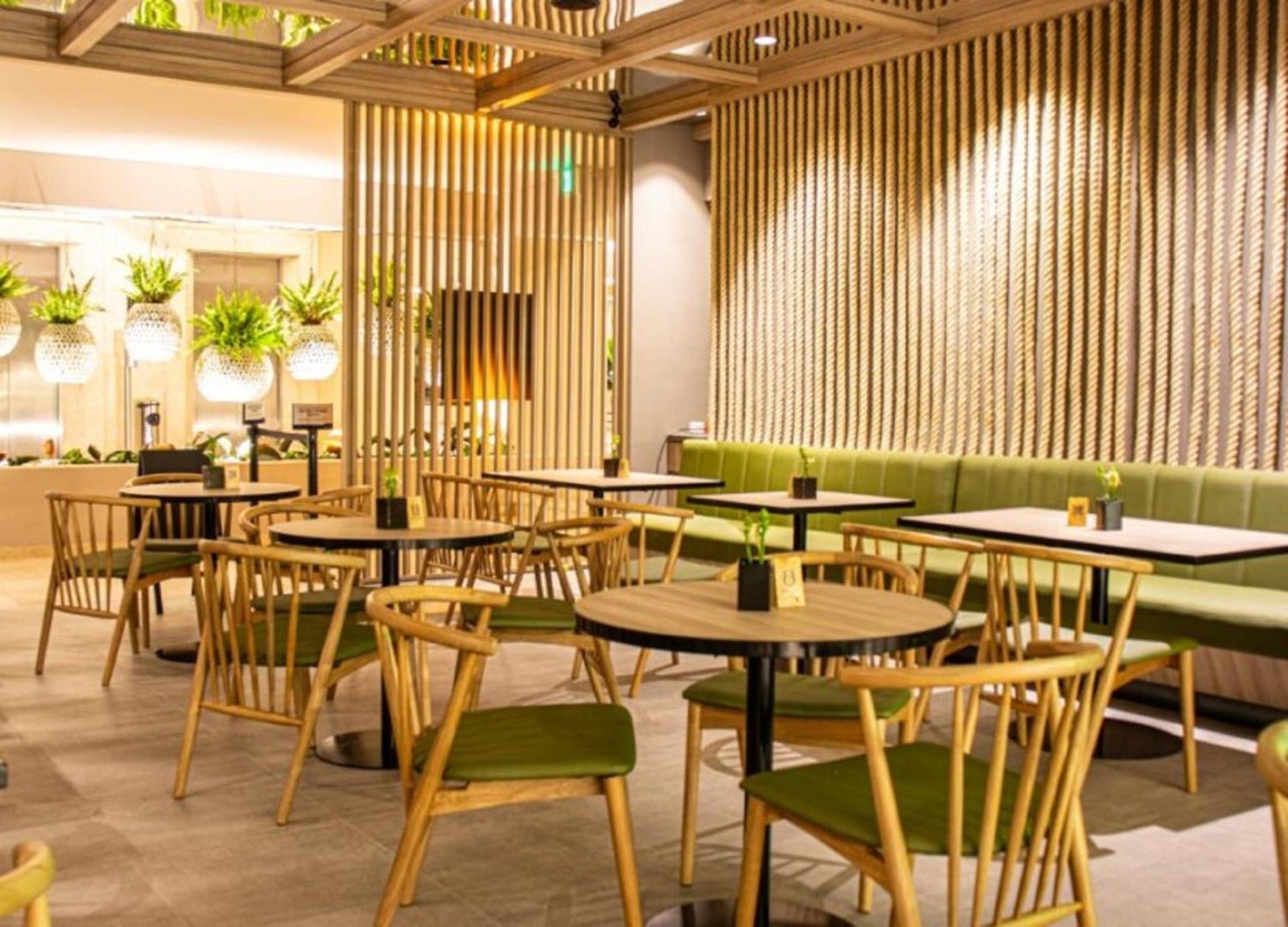 Hotel Estelar Altamira Ibagué Exterior foto Interior of a typical Starbucks in China